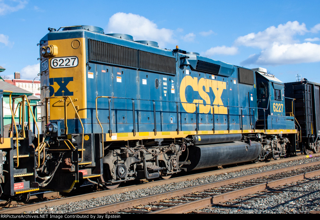 CSX 6227 trails on L012